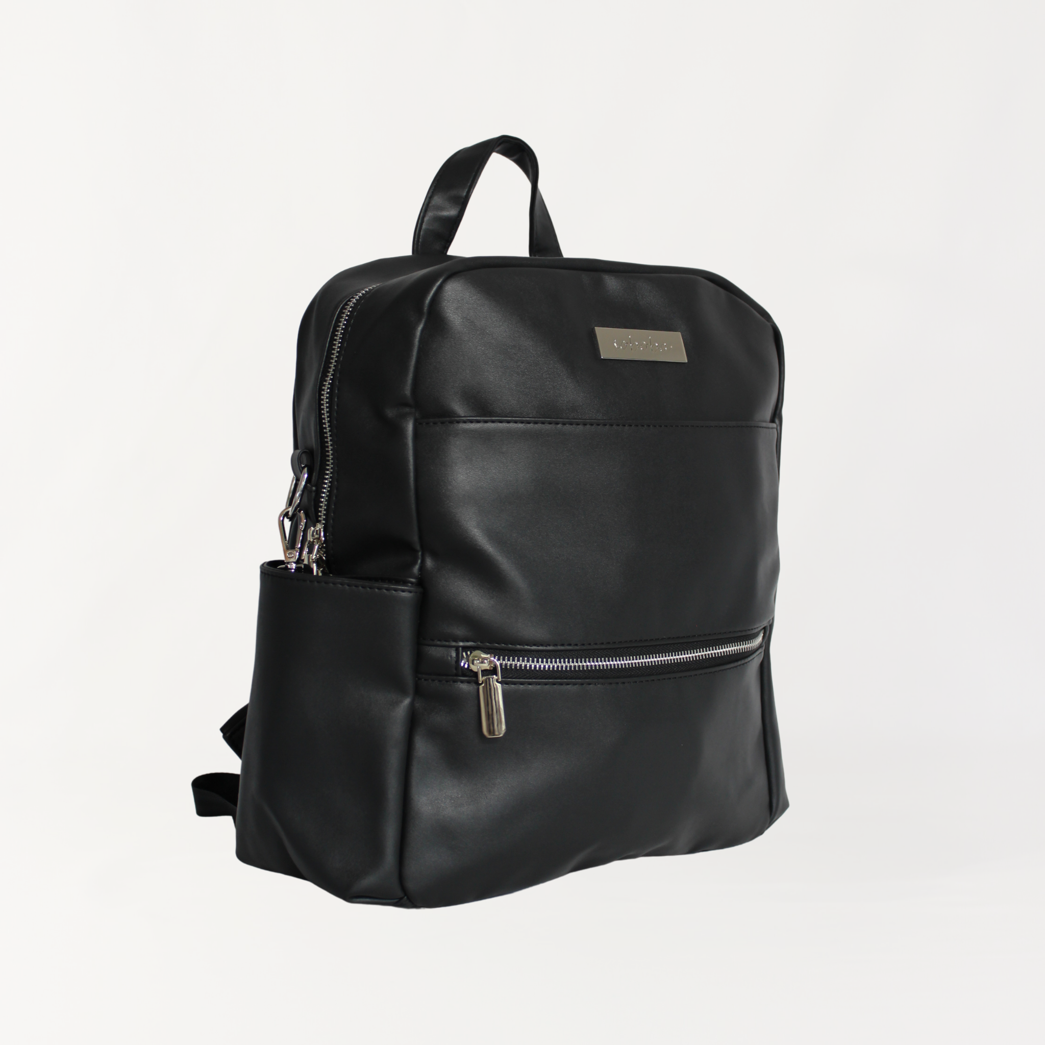 Remmii Carter Nappy Backpack in Black, Angle View