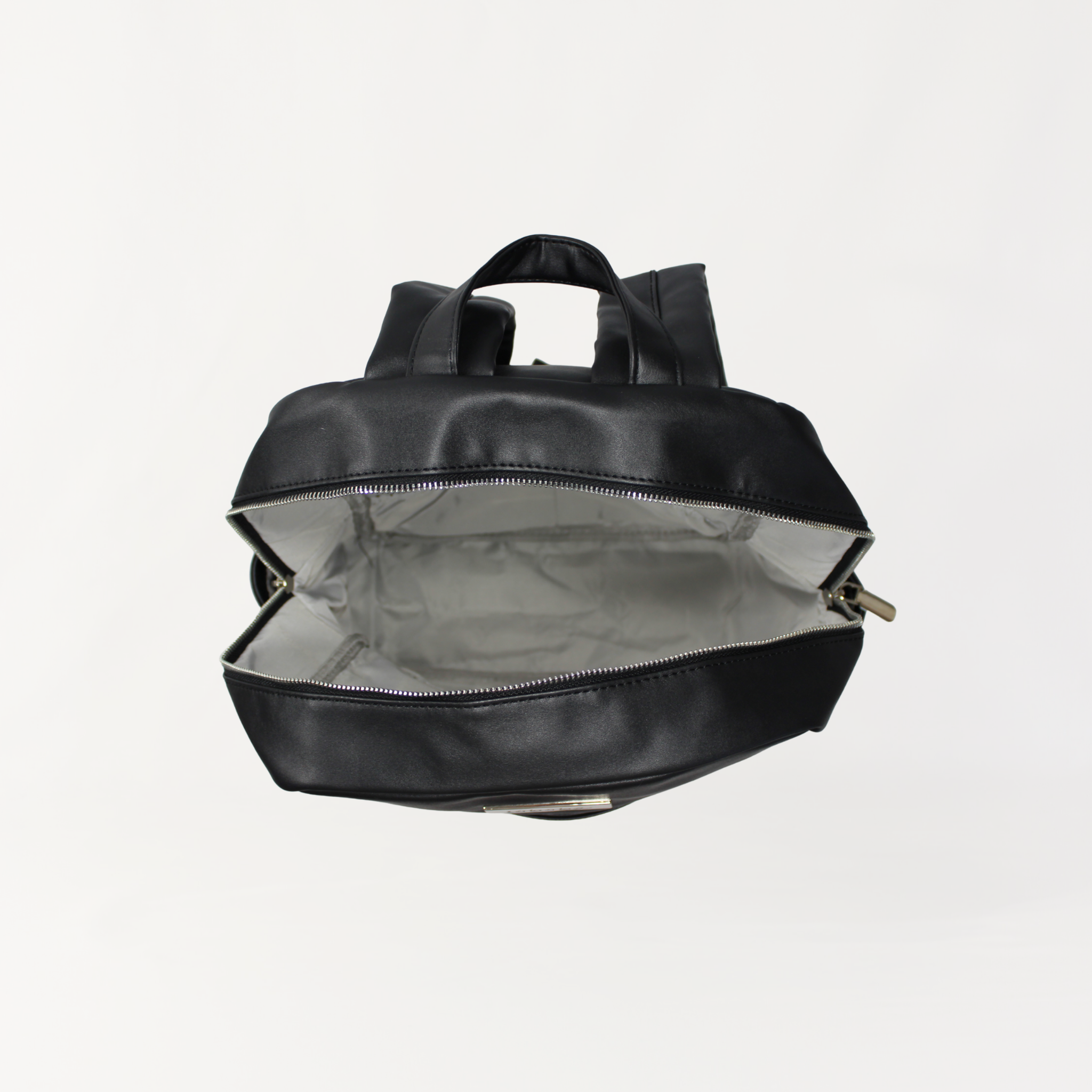 Remmii Carter Nappy Backpack in Black, Bag Is Empty Shown In Top View