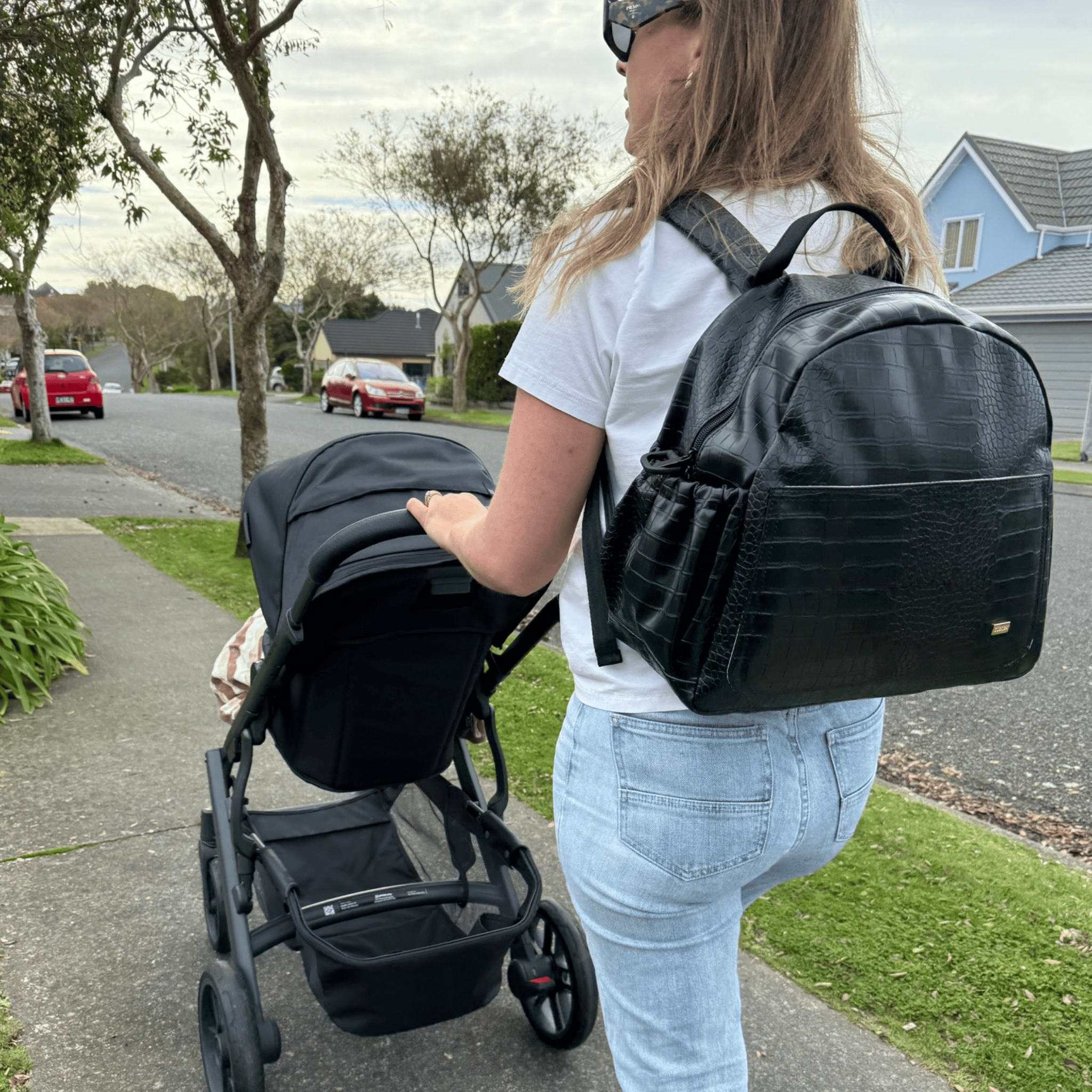 Remmii Emerson Nappy Backpack in Black Croc, Bag Is Being Worn By Mum, Out For A Walk