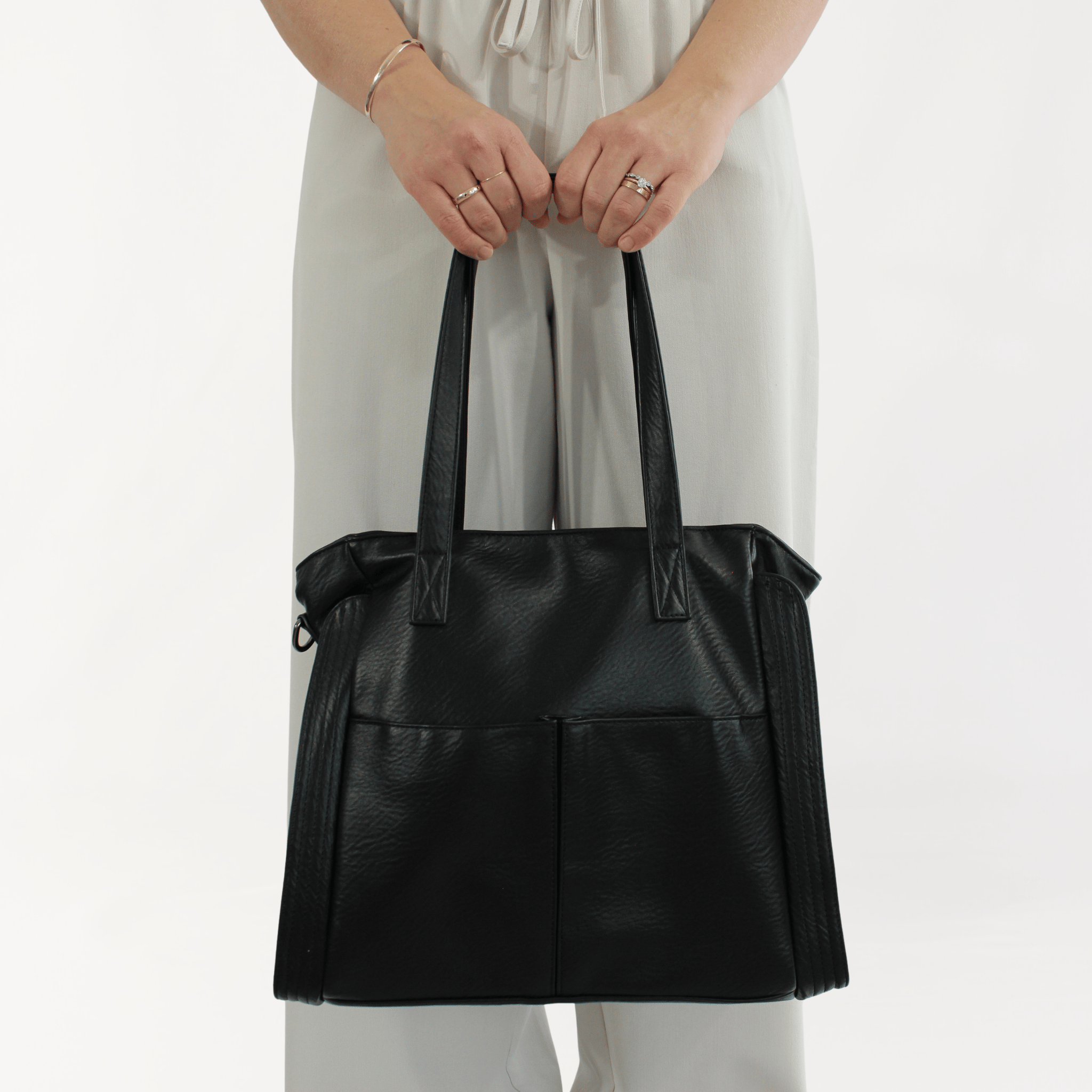 Remmii Harper Baby Tote in Black, Front View With Person