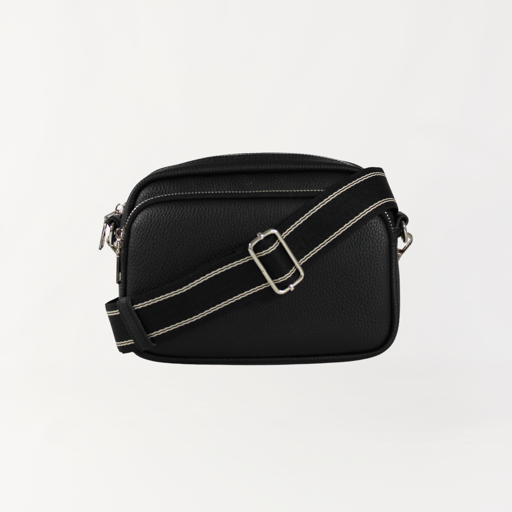 Remmii Riley Crossbody Baby Bag in Black, Front View Of Strap