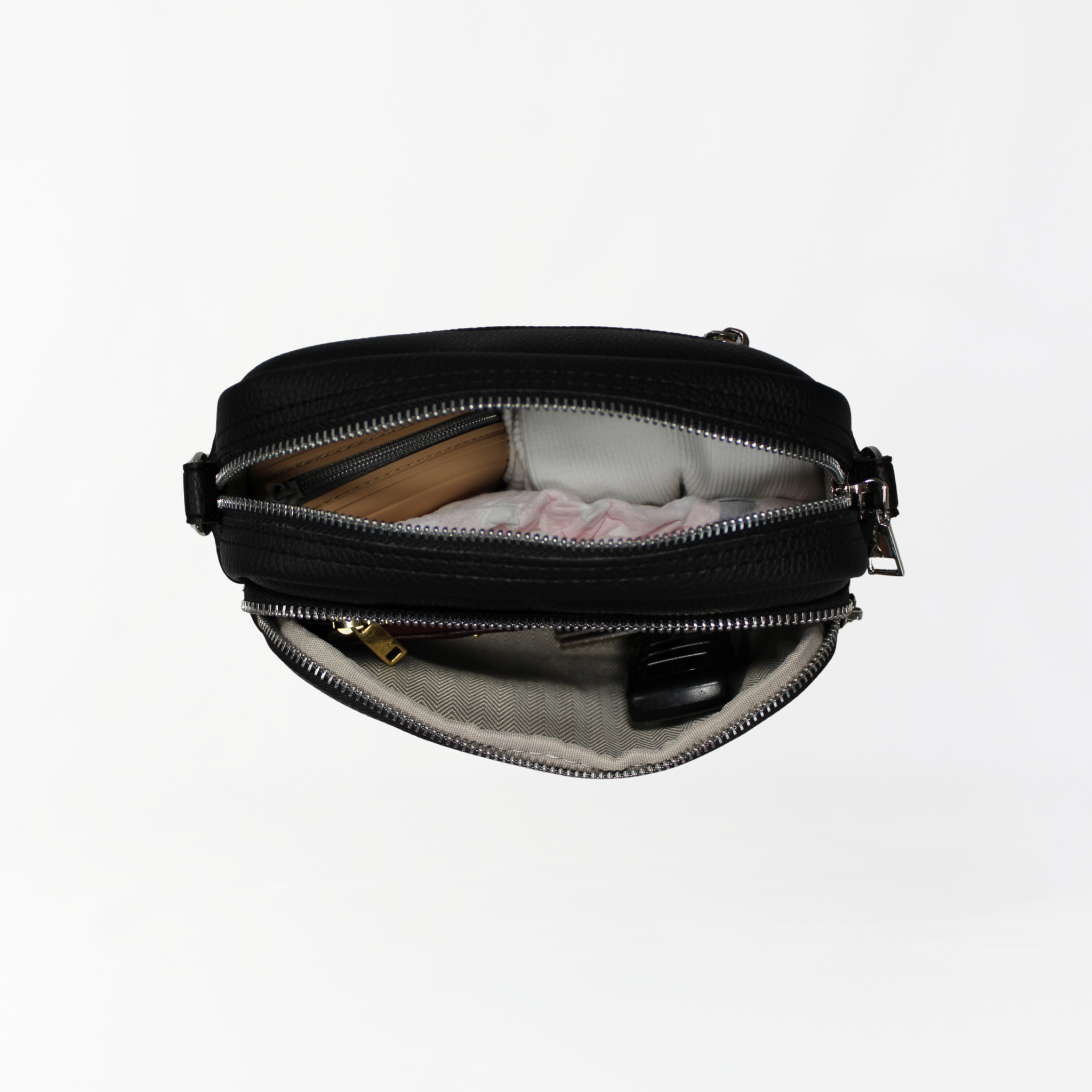 Remmii Riley Crossbody Baby Bag in Black, Bag Is Packed Shown In Top View