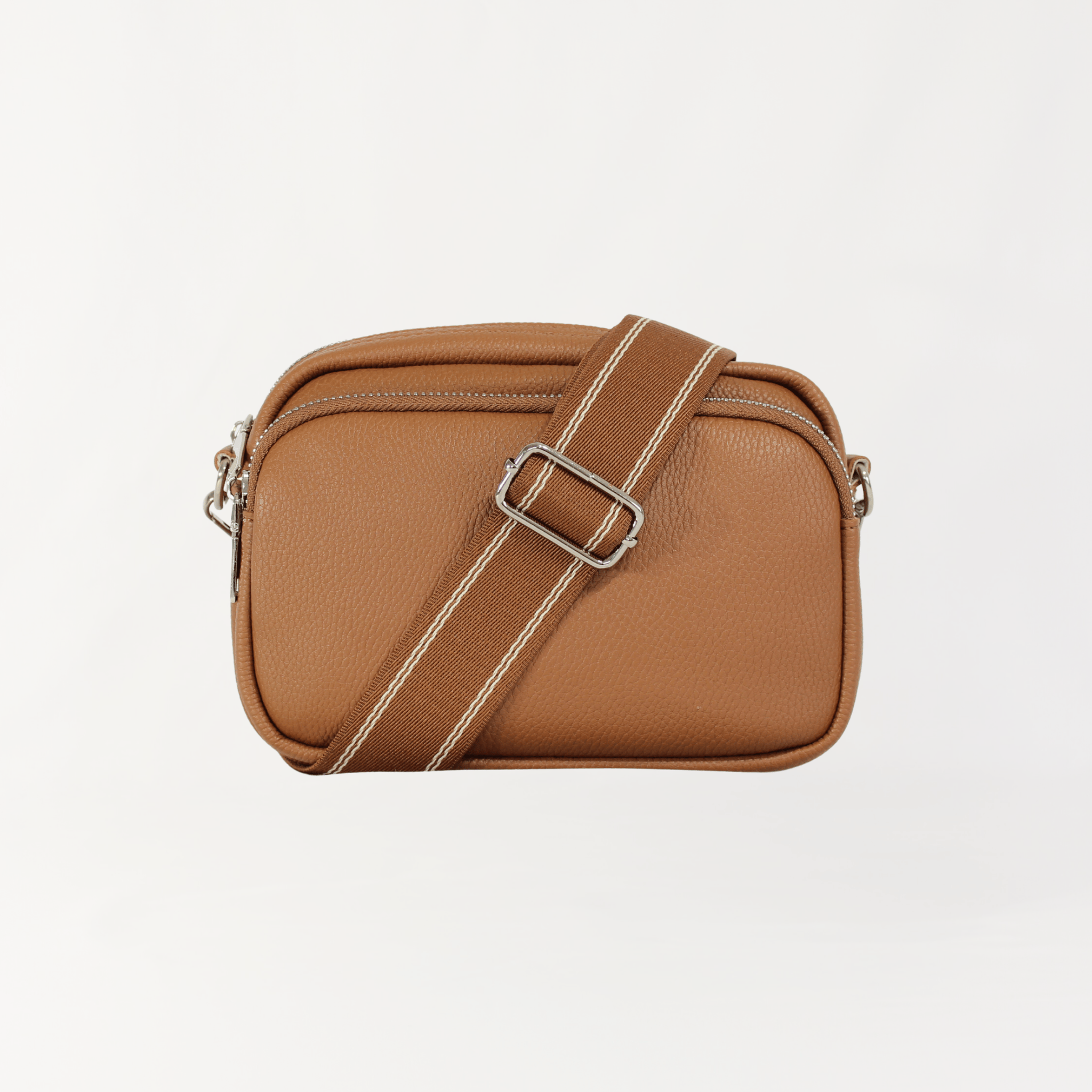 Remmii Riley Crossbody Baby Bag in Caramel, Front View Strap Over Bag