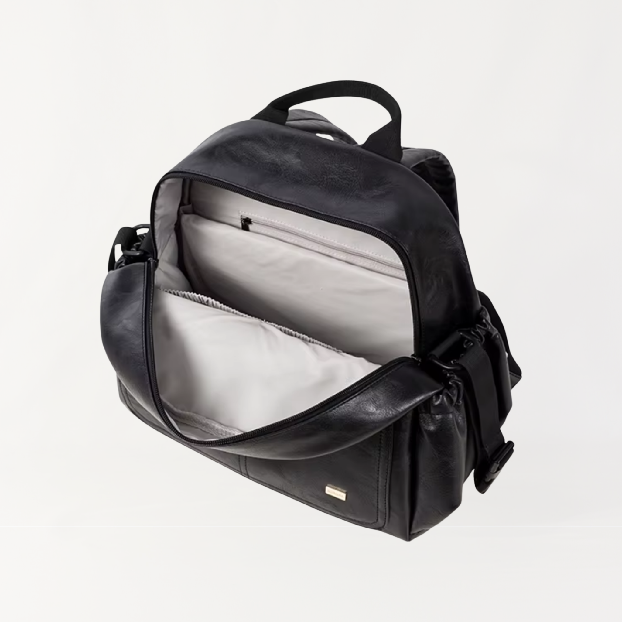 Remmii Emerson Nappy Backpack in Black, Angle View