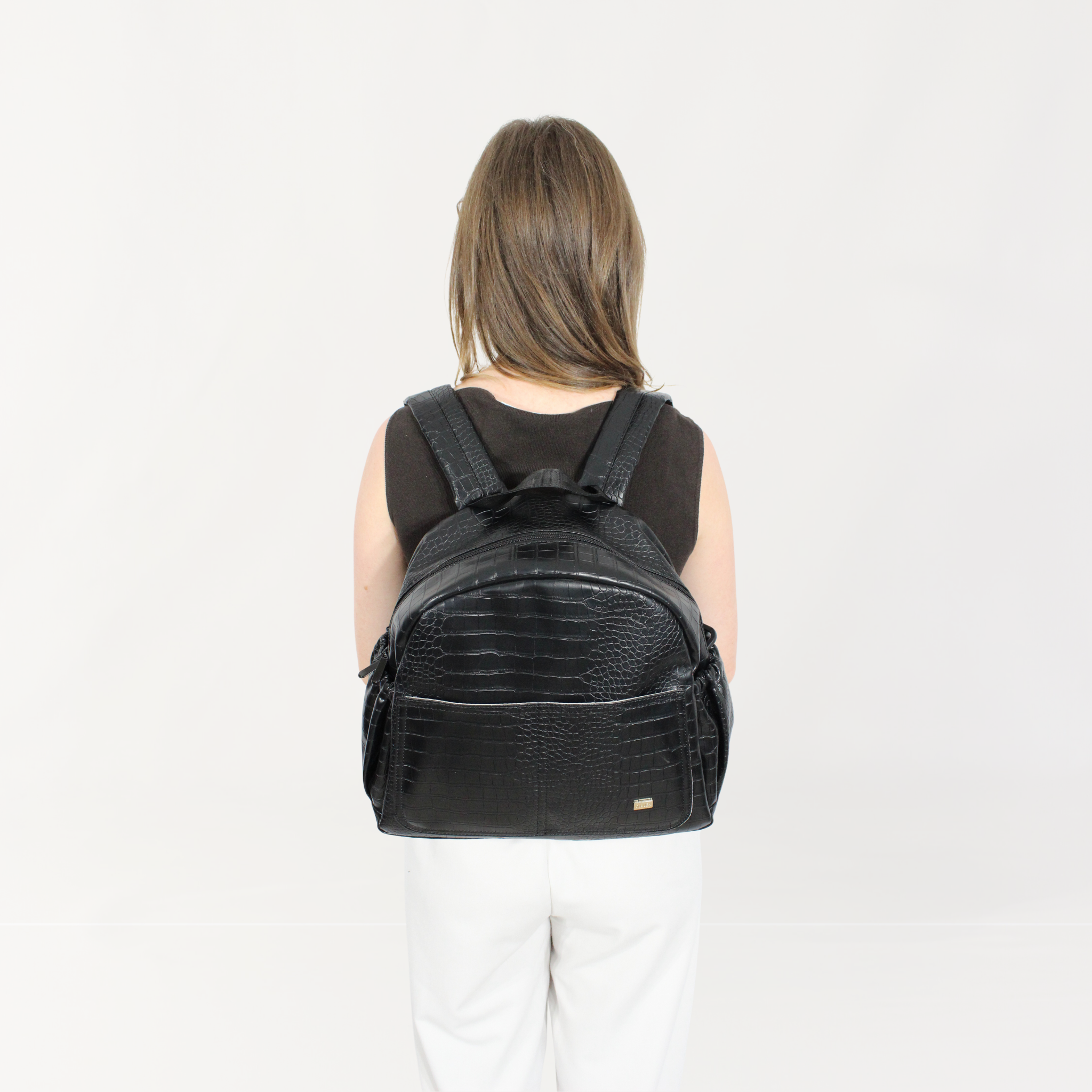 Remmii Emerson Nappy Backpack in Black Croc, Front View Being Worn By Mum
