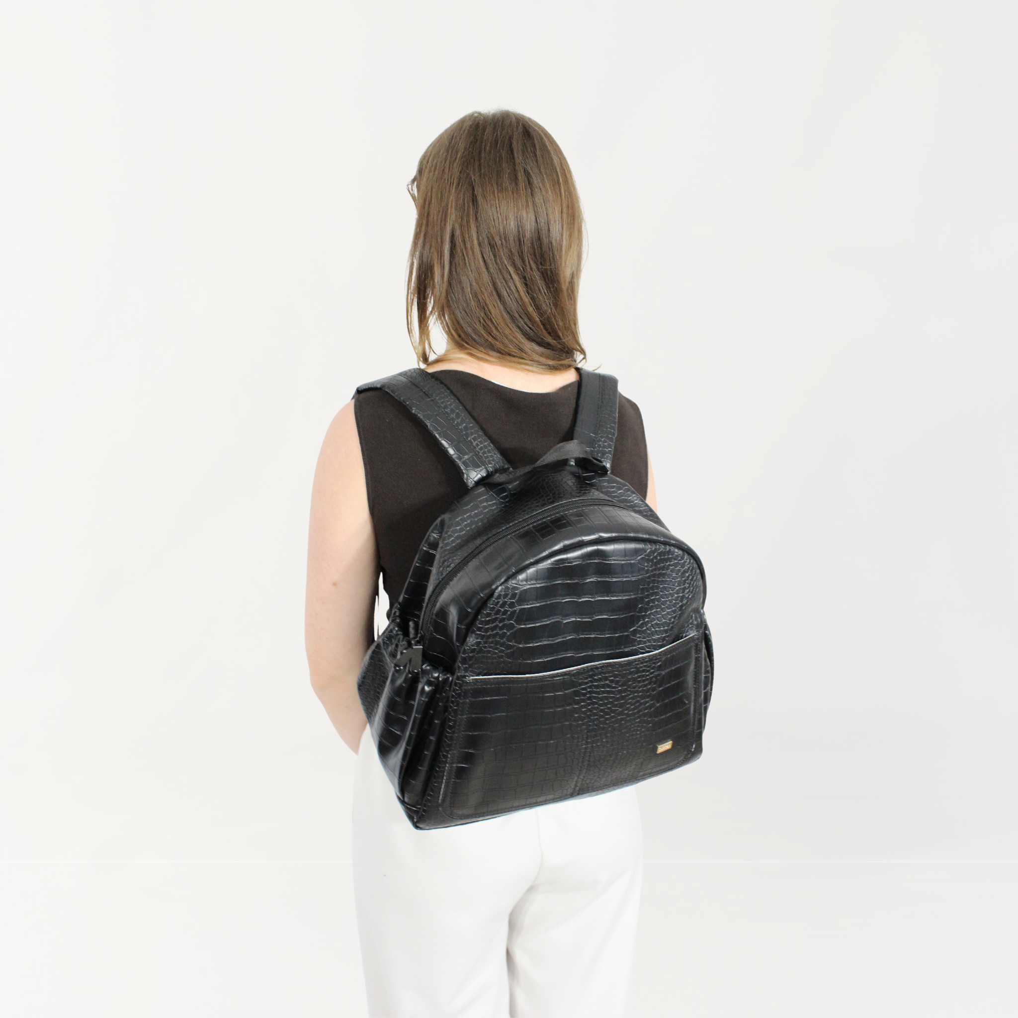Remmii Emerson Nappy Backpack in Black Croc, Front View Being Worn By Mum on Angle