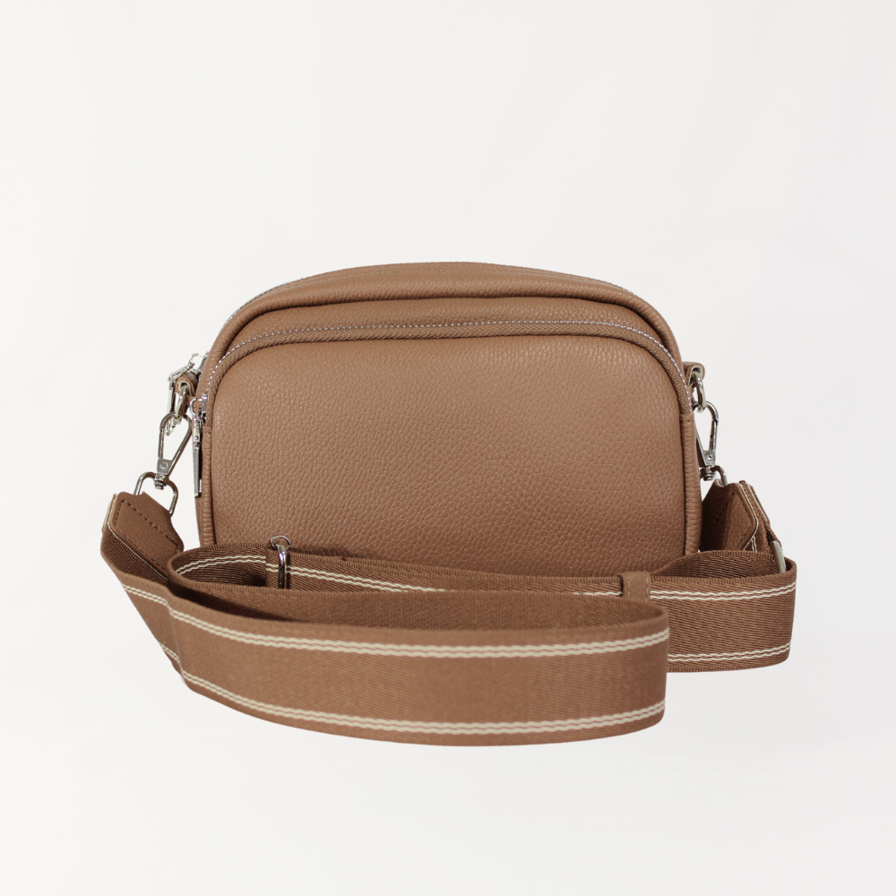Remmii Riley Crossbody Baby Bag in Almond, Front View With Straps