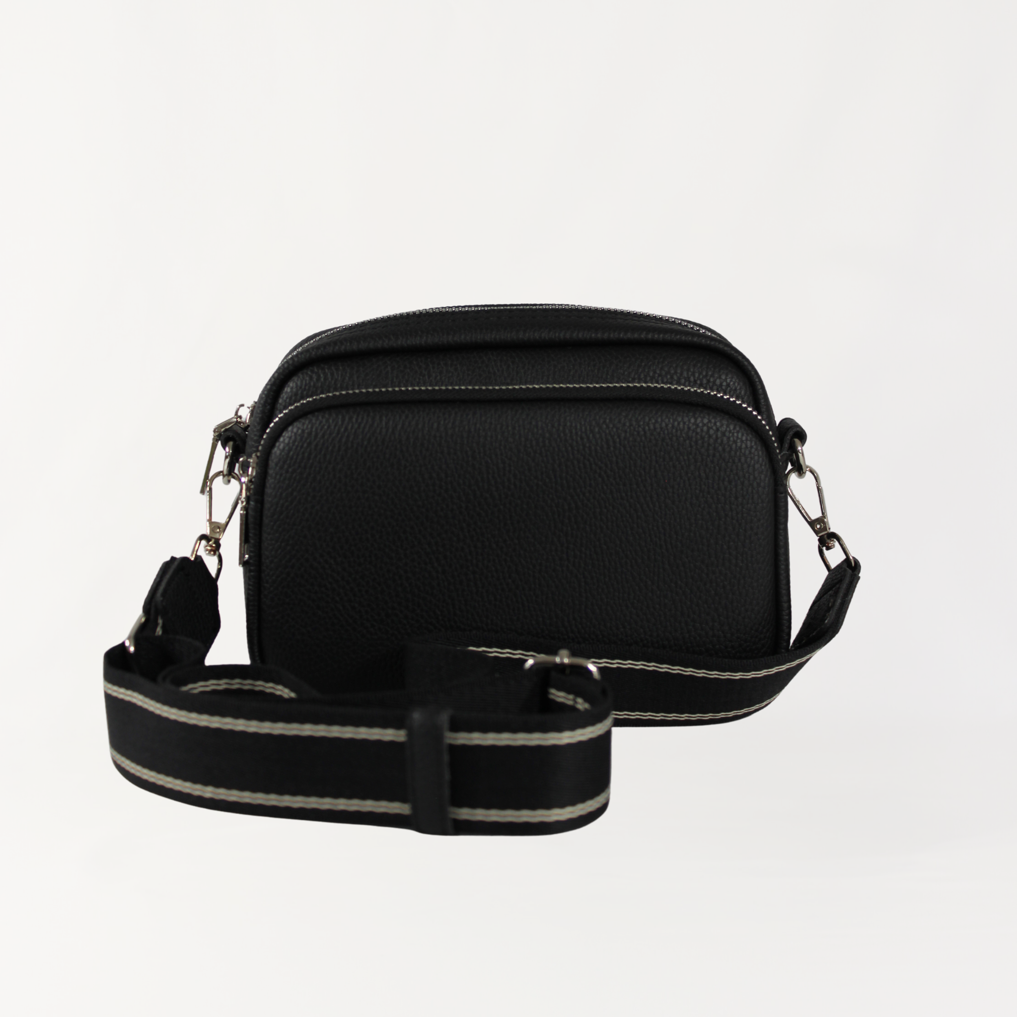 Remmii Riley Crossbody Baby Bag in Black, Front View Of Strap Out